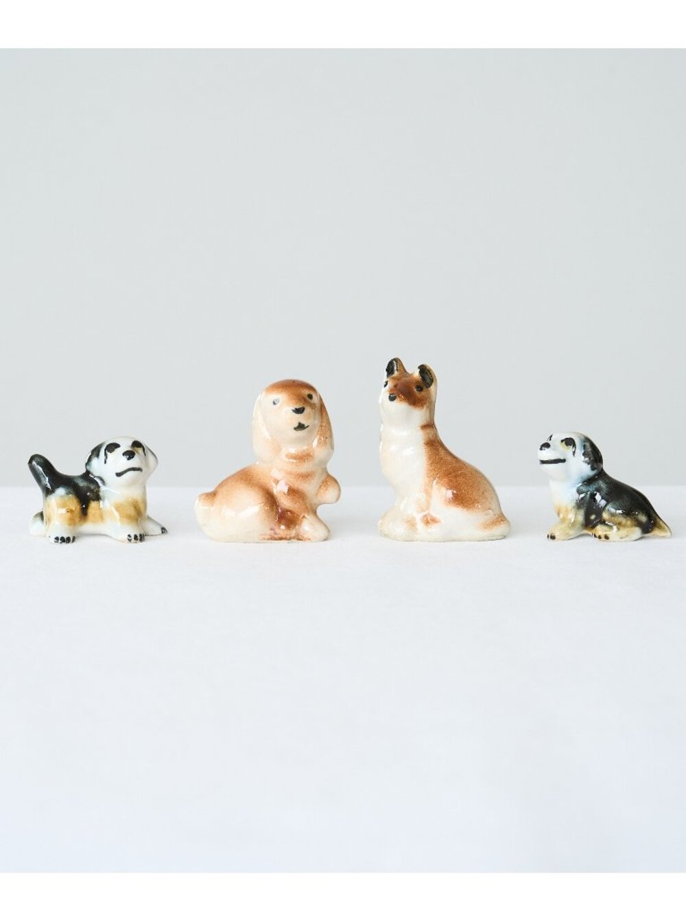 4 Miniature Ceramic Dog Figurines Vintage Brown Black Collie Shepherd Puppy